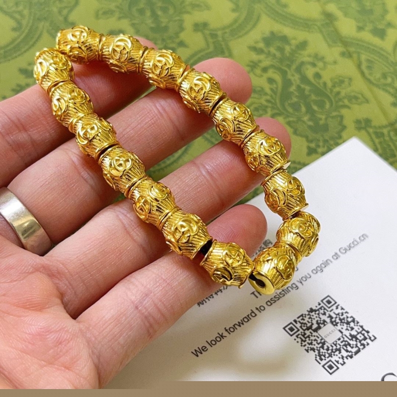 G*u*i bracelets